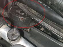 breather with heat shield material covering center hole that lets air in behind rubber membrane