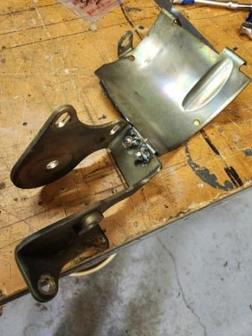 Nuts welded on....bolts fir from top
