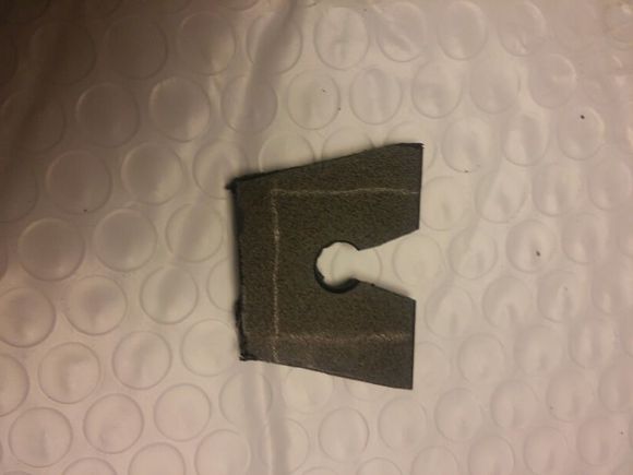started with a simple outline, used a tapered drill to cut the hole then cut the two angled notches, then outside the line to an approximate edge to fold for the replacement I needed