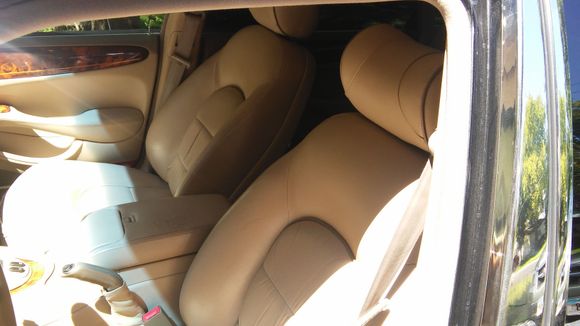 Driver's seat. Leather is in good order.