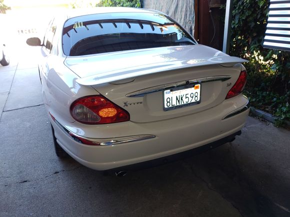 I can't remember what I got the rear spoiler off of but it sure fit like it was made for the car.