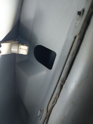 Two bolts here and two bolts below fender you need to open the plastic rocker runner to access. 