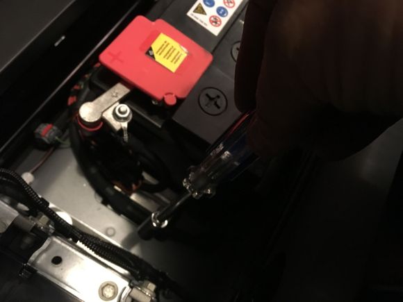 20. On the battery side of the stack, BE VERY CAREFUL.  You will be working right next to the positive battery terminal.  DON'T TOUCH IT WITH YOUR DRIVER!
