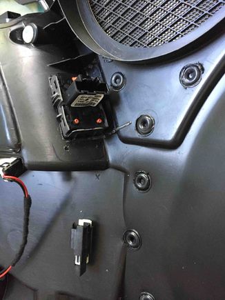 View of the installed switch from behind the door panel