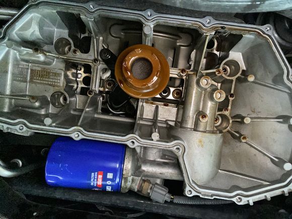 Inside crank case (oil)pan removed for inspection and cleaning.  