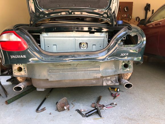 The bottom lip of the trunk is a pretty complex bend - might drill out the spot welds and weld a donor piece from Jag 2.  Additional, you can see the right side is up maybe a couple of inches.