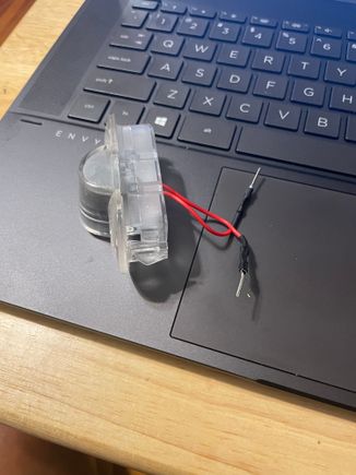 This is one of four purchased logo lights.