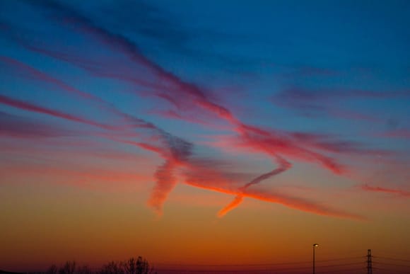Contrails at sunset
