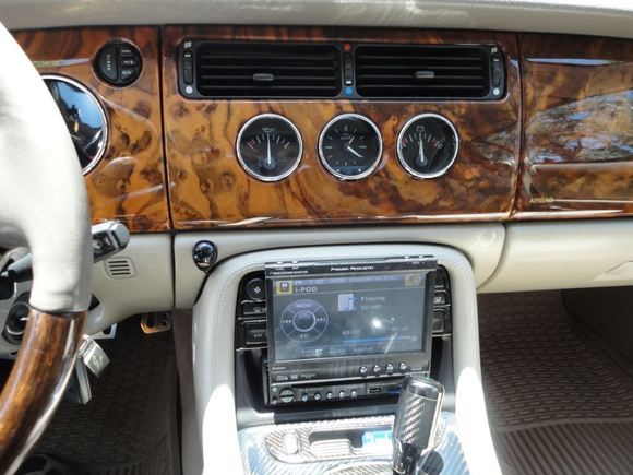 Flip screen up (trick was to keep it from hitting the gear shift lever when it deployed)