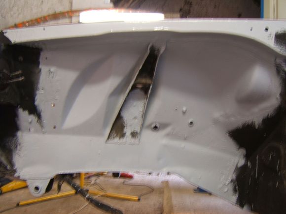 Shock strengthener, important to  treat and seal all round where it is against the inner wing metal 