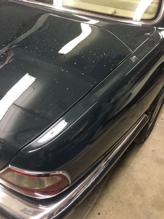 Repaired right rear fender.  Good paint match.  The spots you see are from the polishing compound...car has not been washed yet.