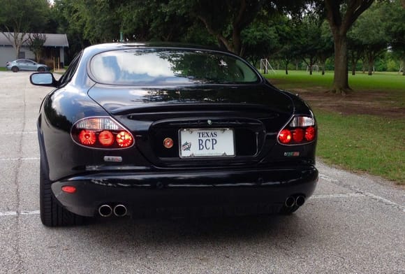 2005 XKR Coupe with Victory/Edition Tail Lights  with LED Bulbs as seen from a Porsche