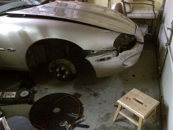After I removed the headlight I discovered that this will be relatively easy. The porta-power will do 99% of the work.