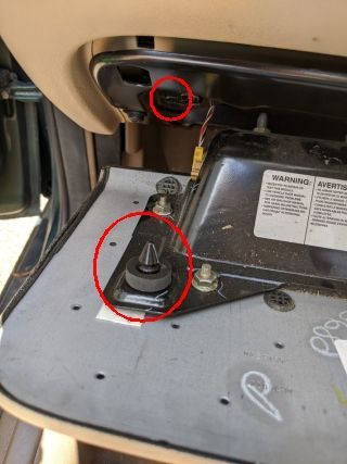 The fastener in the foreground was held in by a spring clip behind the bracket.