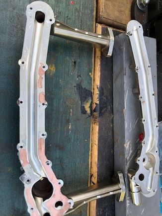 The upper and lower manifold split. Flat faced joints with a smear of silicon adhesive.