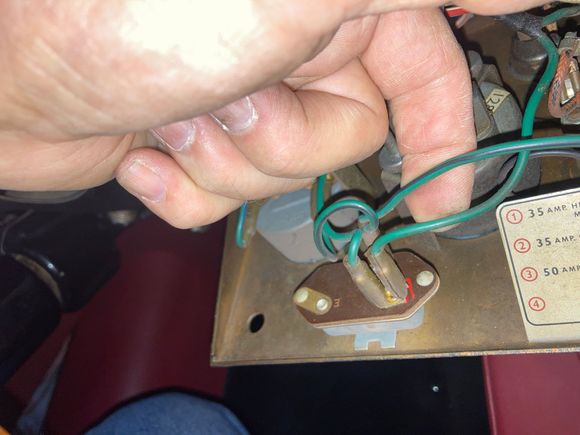Here you can see the wire - my finger is touching it, and my thumb is against the top of the ring terminal. 
