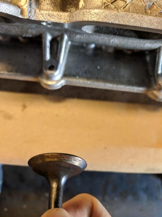 Exhaust valves are too far gone and I'm pretty sure those pits can't be lapped out - new ones ordered.