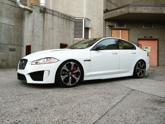 The lowest it will go because xfr-s have a lowered suspension to begin with.