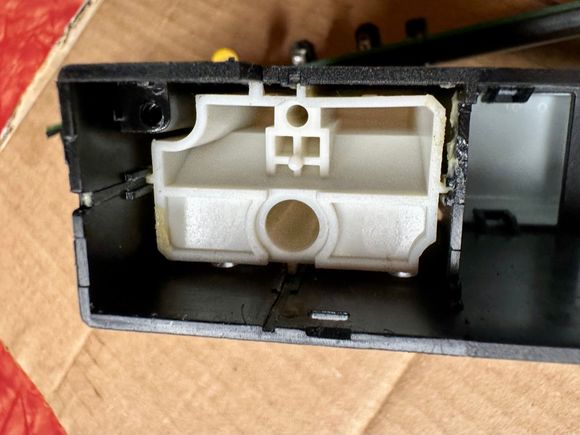 Rear view of hazard switch inner button.