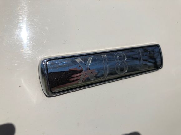 Tape removed, then letters filled in by hand. A toothpick with one end cut to a wedge shape works excellent for cleaning up any coloring outside of the lines. 