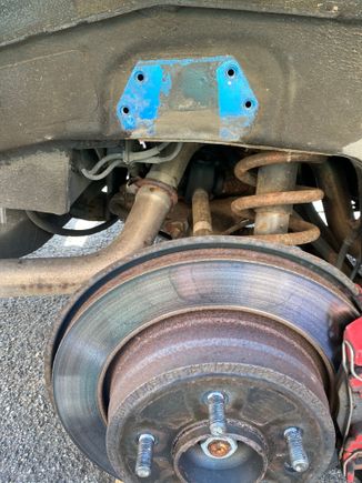 The Bump Stop removed showing the four captive nuts which the bolts screw into (longest bolts at the bottom)