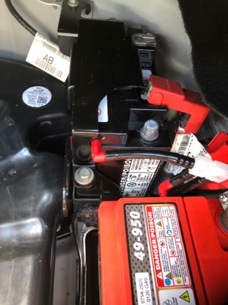 Remove start/stop battery and ebnd bracket out of the way