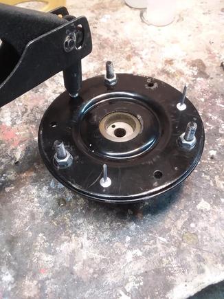 Compress everything with the mounting nuts and re-rivet