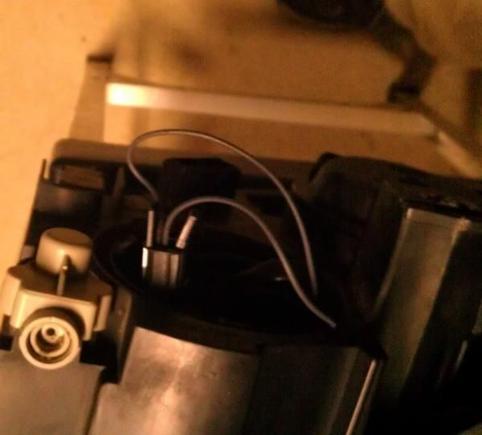 Park lamp partially pulled, showing tabs.