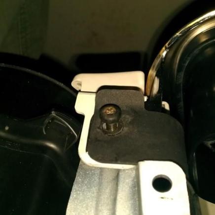 Remove 2 (T30) Screws and remove grill.