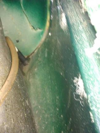 what is this hose for? Located at right rear side of trunk.