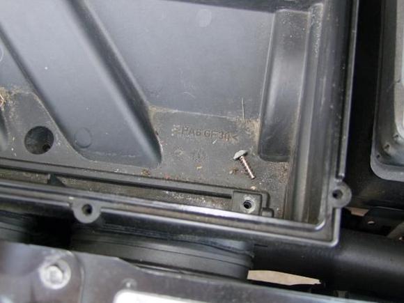 Step 3
Remove the air filter cover and remove the two phillips screws then pull up on the box assembly to remove from the mounting flange.