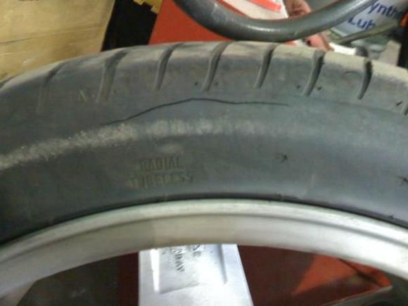2009 6 3 (2) Bad Riken front tires which I spotted when doing my brakes.  Inside sidewall cracking.  Who installs walmart tires on this car?
