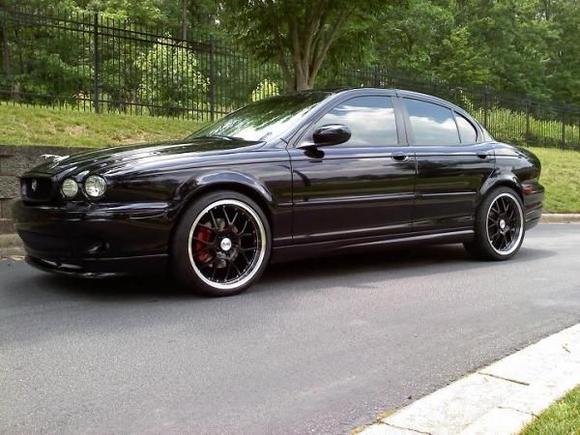 Sitting low with a wide stance...