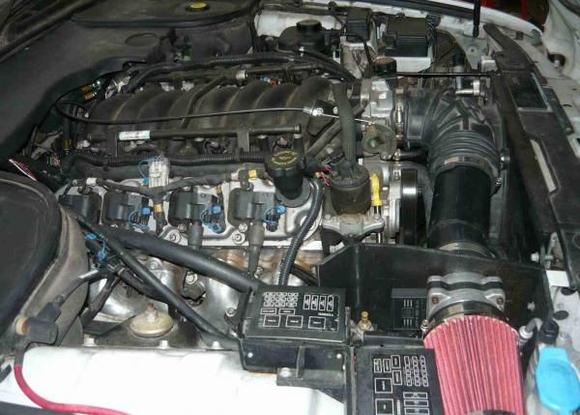 Engine compartment view- right side (stock Camaro fuse and relay panels for LS1 engine wiring in foreground)