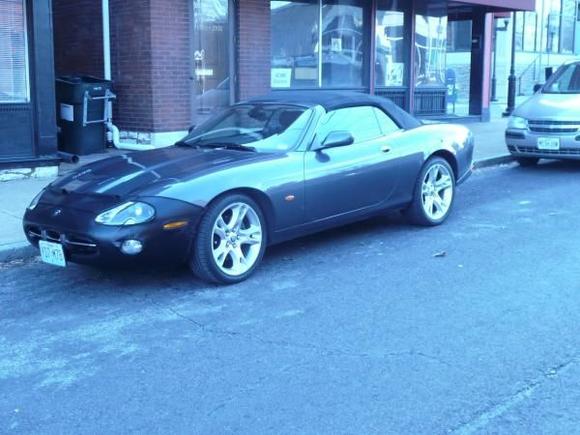 In front of the shop with er bra on