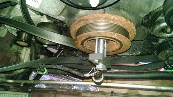 Now I'm removing the damper.  Watch out for the air conditioning pressure switch wiring and connector.