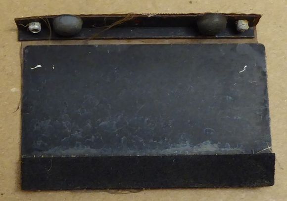 Vent flap as removed, I think the rubber buttons at the top were added trying to stop the noise after the foam left Nice try but useless !