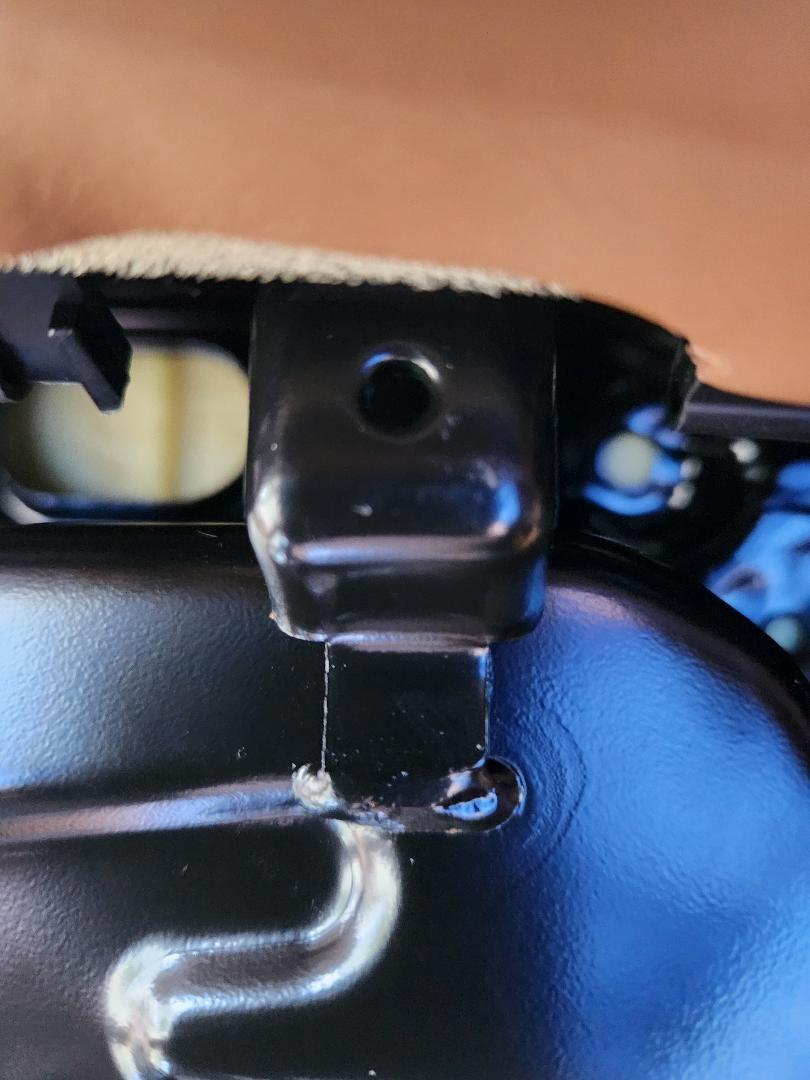 This is one of the two holes at the top of the seat. No threads