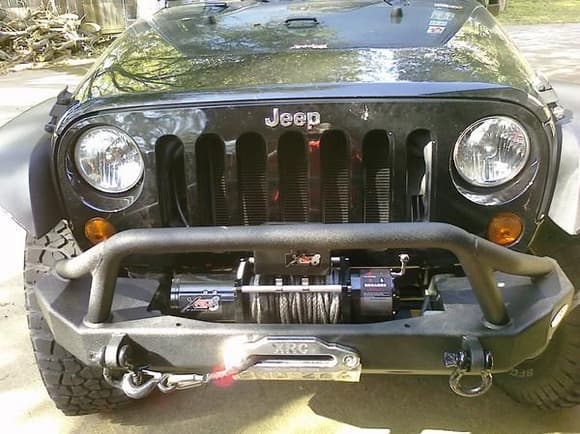 So after hacking my factory bumper, I ended up buying a new one (go figure).  Needed a winch after getting stuck so much on my first wheeling trip.