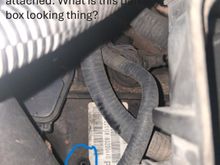 Box / Part sitting below battery - what is this part?? Looks like one end of the found hooked hose broke off from here. Box / Part has Sticker showing: 8l8P-7000AA HI 4x2
220108 80220440   PTAP