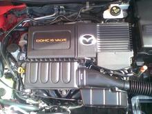 1.8 16V (Z6 engine) of mazda3, low fuel consumption, combination of automatic transmission and manual mode for better and fast power pick up.