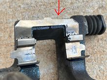 Retaining clip where brake pad sits in. 
