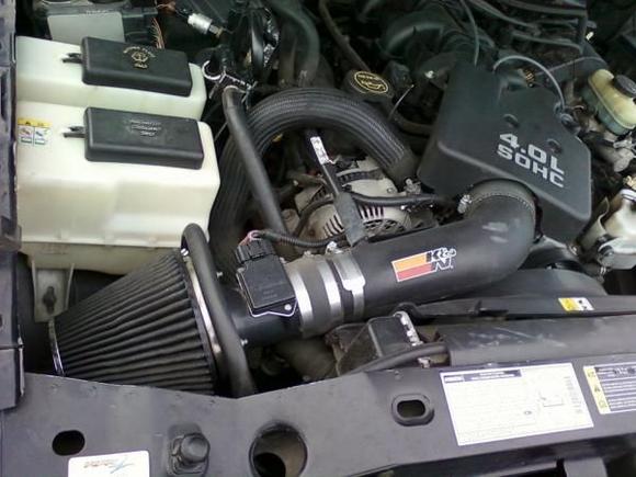 The guy installed a K&amp;N Cold Air Intake.  He said it added a lil power, but mainly made it sound beastly.  It does sound pretty nice....  :D