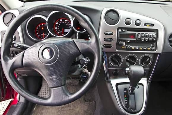 05 Pontiac Vibe. The cockpit is the only thing sporty about it. It does not accelerate, it gradually collects speed and makes a lot of noise doing that.