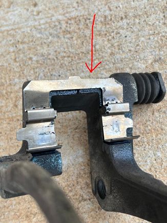 Retaining clip where brake pad sits in. 
