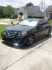 my 2014 mercedes E350 black beauty and favorite teams