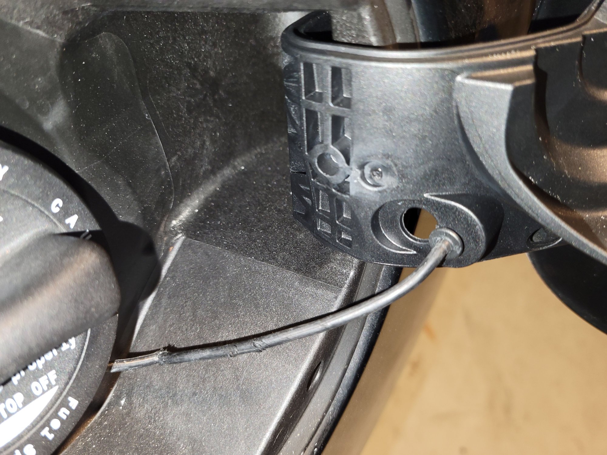 Fuel cap tether is detached from car Forums