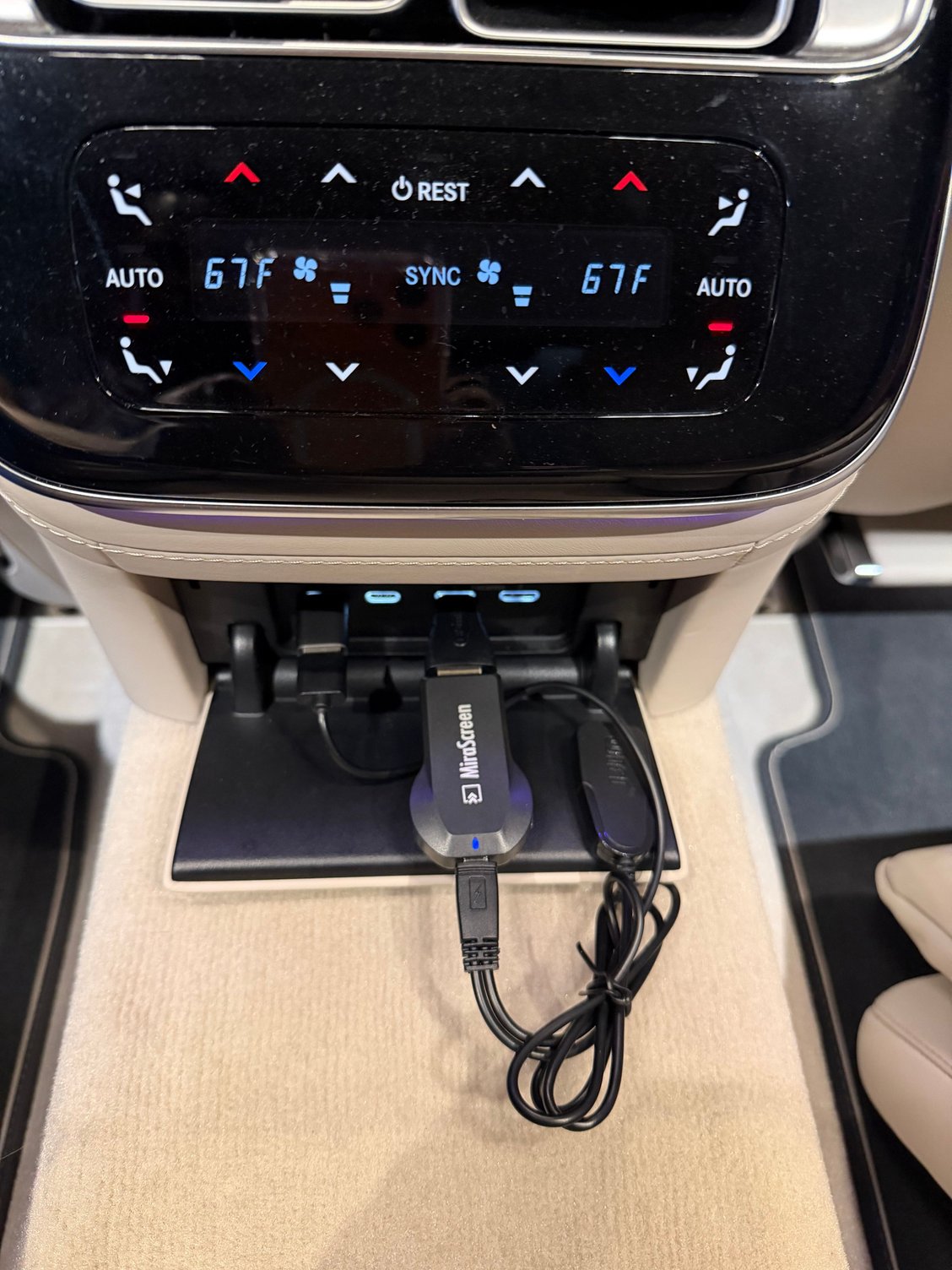 1. Mirascreen Device with mini HDMI attachment and USB-C adapter.