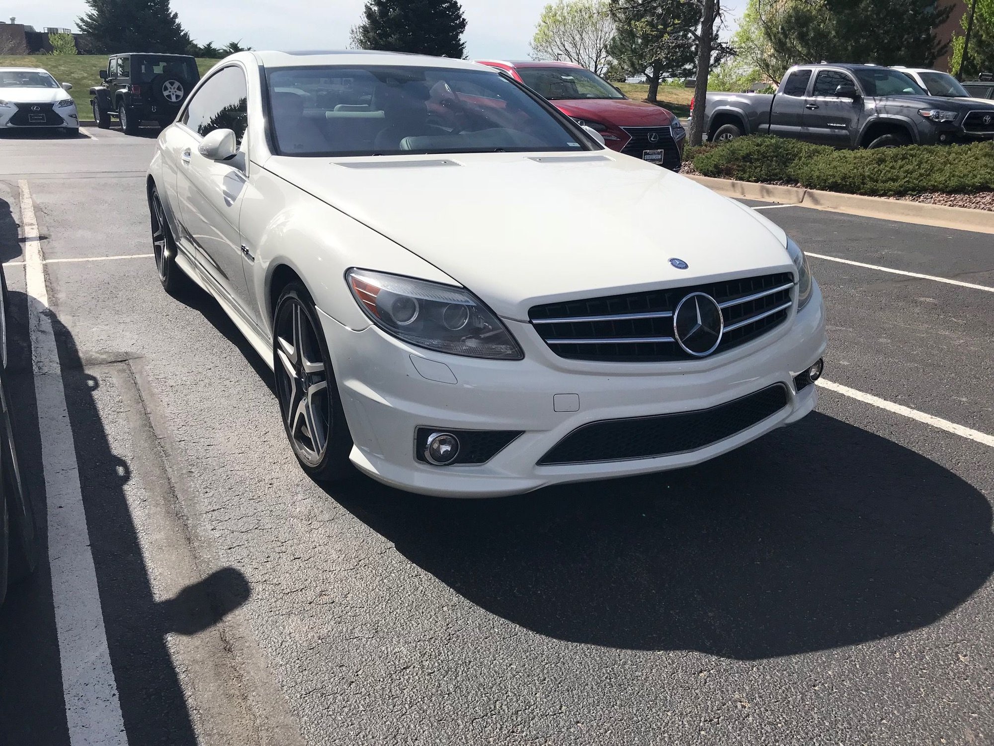 2009 Mercedes-Benz CL63 AMG - 2009 CL63 AMG White on White Designo $27,500 - Used - VIN WDDEJ77X09A019806 - 67,900 Miles - 8 cyl - 2WD - Automatic - Coupe - White - Greenwood Village, CO 80111, United States