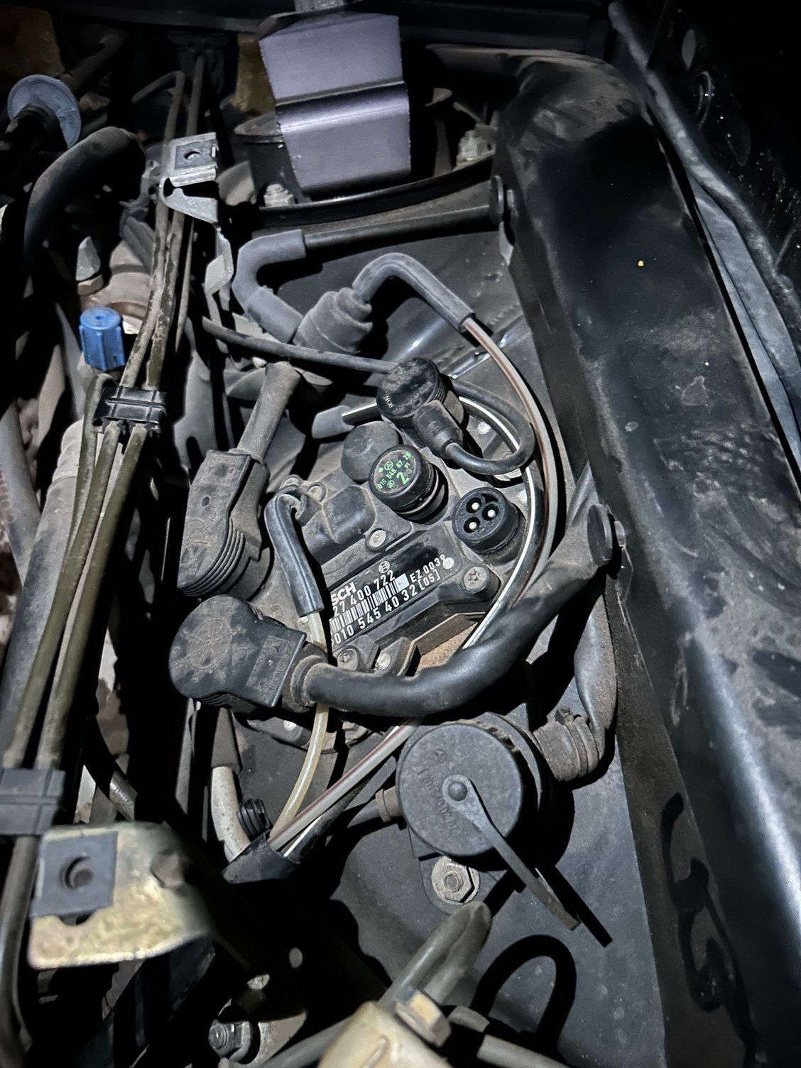 This is where the wire come from it goes down and ys by the oil pan 